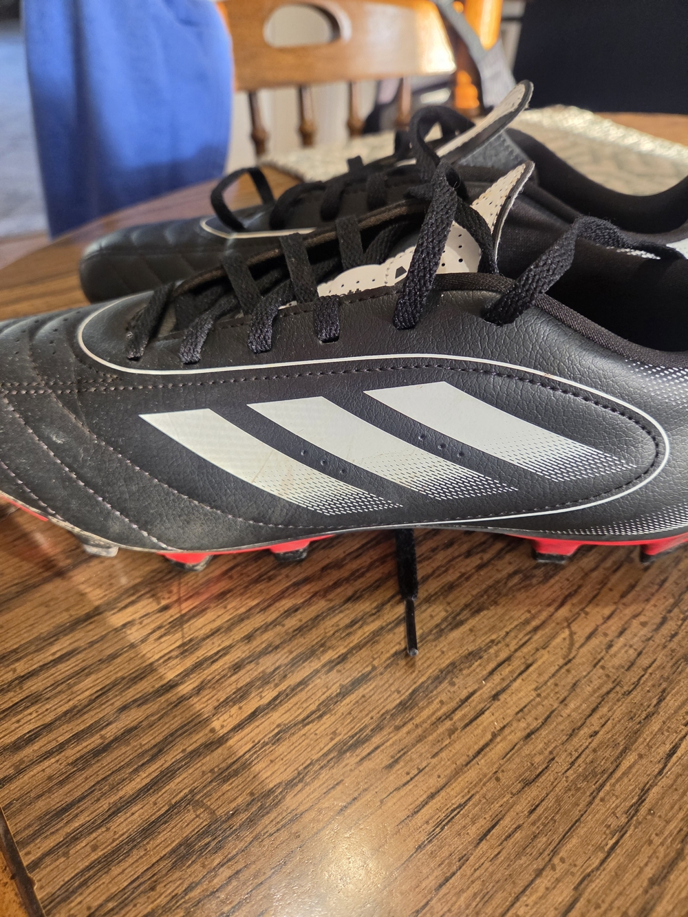 adidas Black and White Men's Soccer Cleats with Red Accents